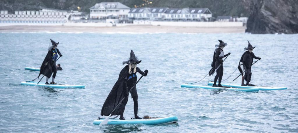 Newquay Unleashes the Undead- Thousands Flock to Annual Zombie Crawl and Witch Paddle