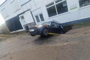 Shocking Sinkhole Engulfs Car Outside Redruth Bakery