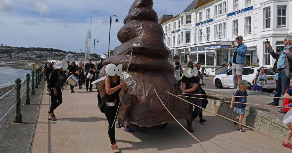 Penzance Protesters Drag Huge Poo Along Seafront