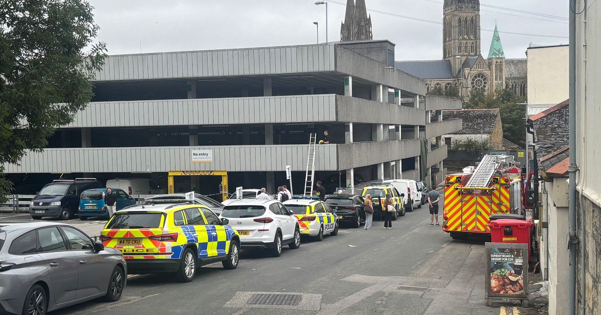 Photos Capture Ongoing Police Incident at Truro Car Park