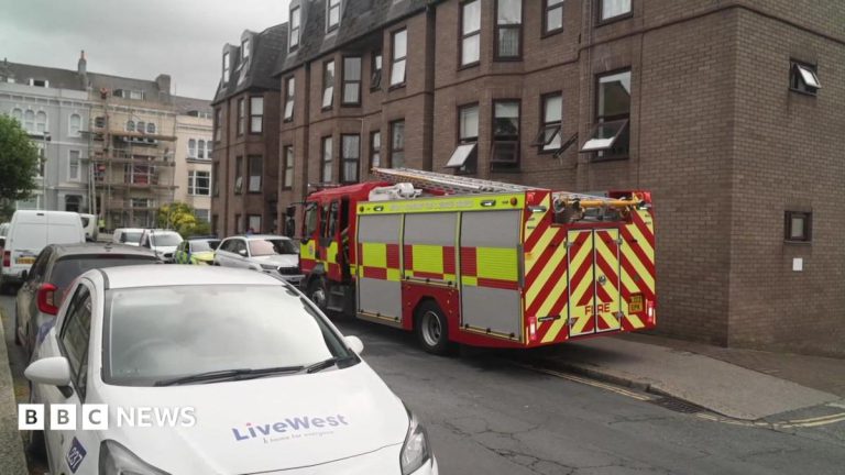 Man Arrested After Flat Fire Forces 30 to Evacuate